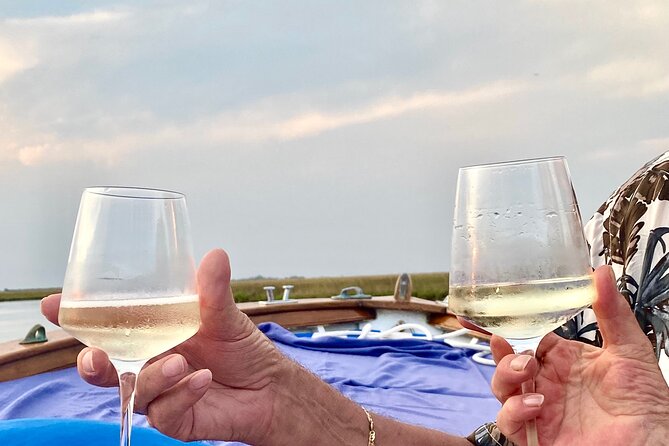 Aperitif at sunset in the Venice lagoon on a private boat. - Why This Sunset Aperitivo Works Better Than the Waterfront Rush