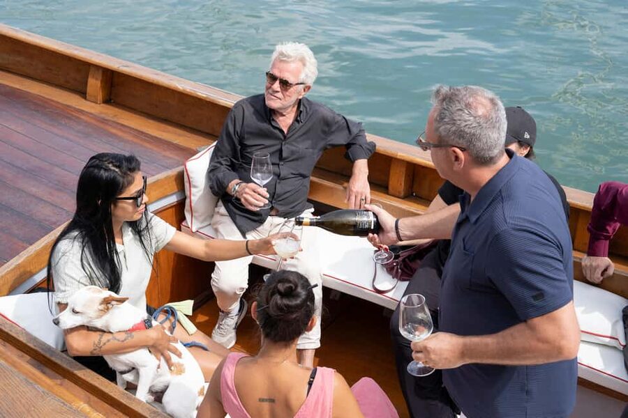 Check out Venice from a different angle: a scenic tour on a traditional boat. - Leaving the heart behind: San Giorgio Maggiore by way of the quieter south lagoon