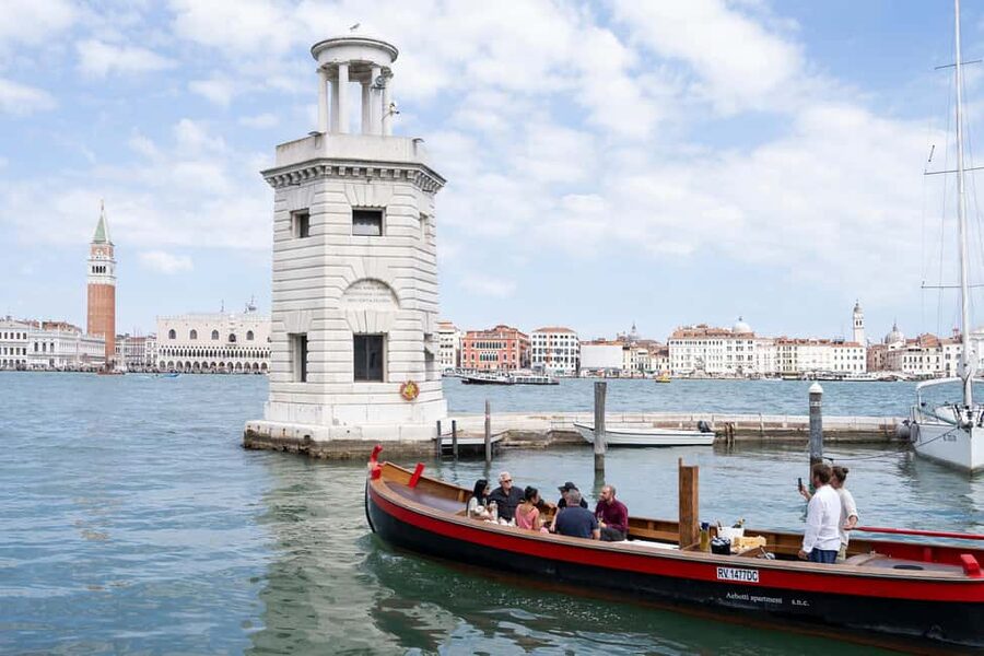 Check out Venice from a different angle: a scenic tour on a traditional boat. - The less-crowded Giudecca shoreline you rarely get to see