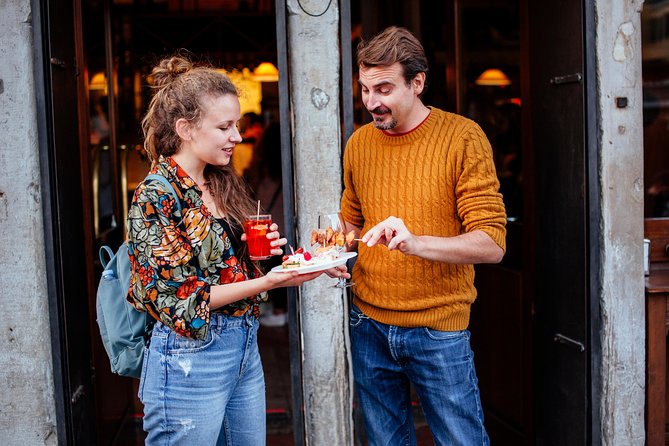 Drinks & Bites in Venice Private Tour - Rialto Bridge at dusk: the oldest of the canal-crossing stories