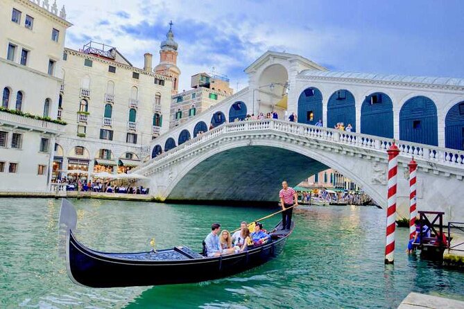 Explore the Canals on an Authentic Gondola Tour Venetian Dreams - Weather and route changes: what to expect