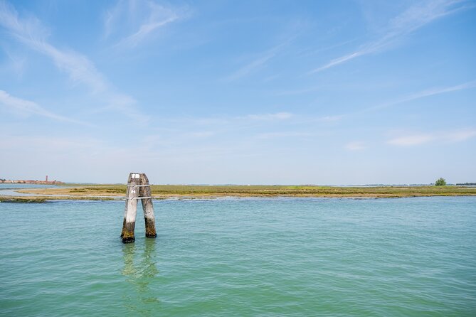 FullDay tour to Murano & Burano with panoramic view over St. Mark - Burano’s colorful streets: free time, lace museum option, and best use of your visit