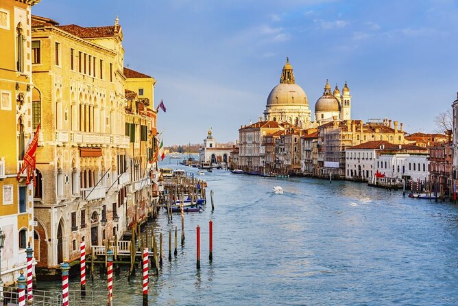 Morning Magic: Venice City Walk and Gondola Tour - Teatro La Fenice area and the drama behind the architecture