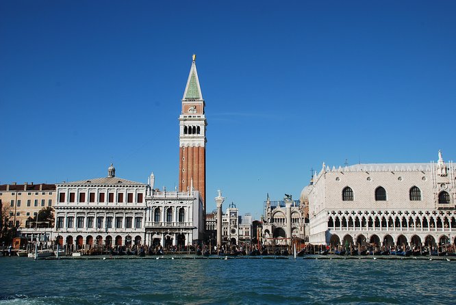 Small Group Venice Grand Canal Panoramic Tour - Boat comfort, sound, and photo strategy on a water-taxi style launch