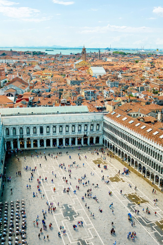 Venice: Bell Tower & St Mark's Square History Gallery Ticket - The bell tower experience: bells, breeze, and how weather changes everything