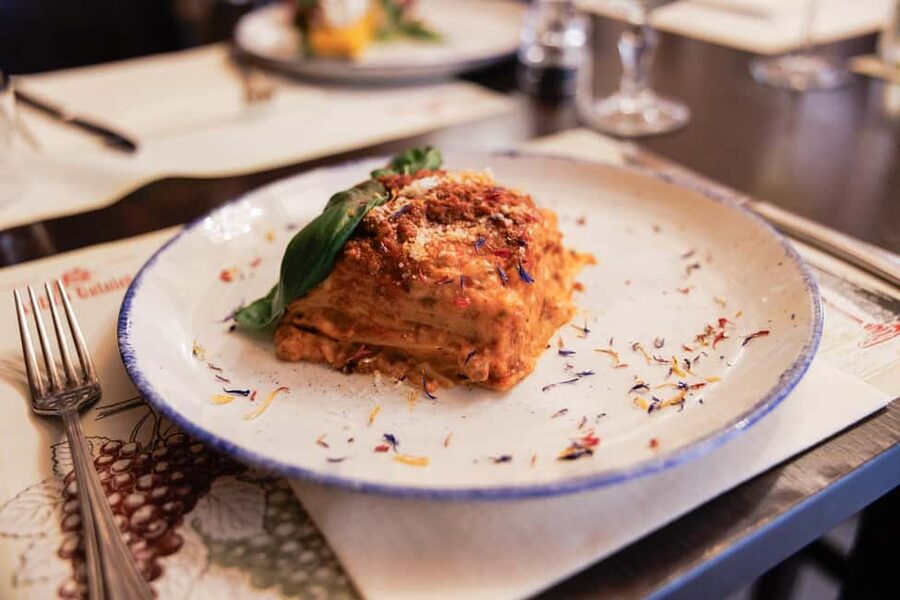 Venice Food Tasting Tour: Bites, Wine, Dinner & Local Guide - Stop 2: fish cicchetti and a glass of ombra wine