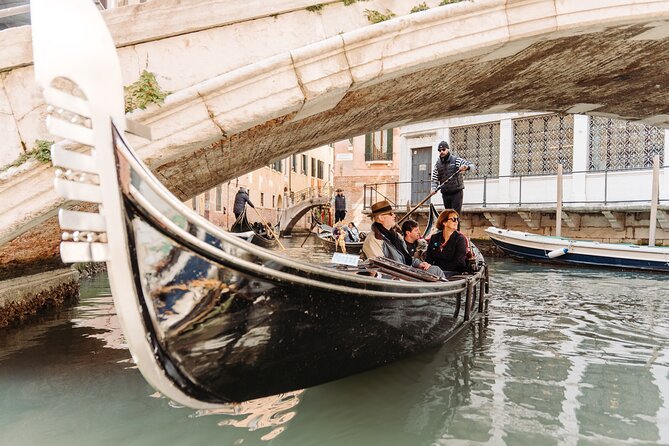 Venice In a Day: St Mark's, Doges Palace Gondola Ride & City Tour - Gondola time on the Grand Canal, plus quieter back canals