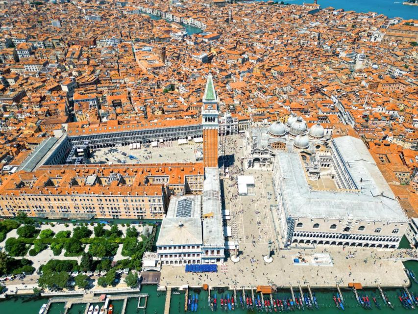 Venice: St. Mark's Basilica and Gondola Morning Tour - The basilica terrace: where the square finally makes sense