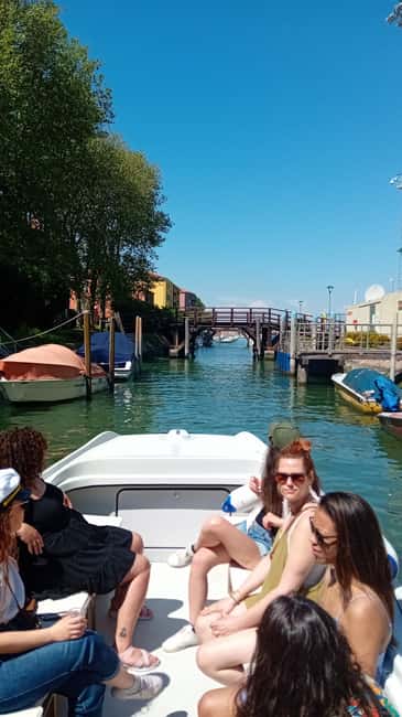 Venice: Venetian Aperitif on the Lagoon - Hilton Molino Stucky Venice: passing a landmark hotel from the lagoon
